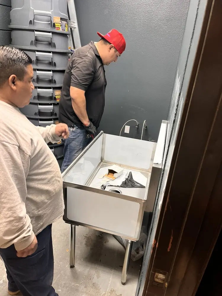 Commercial plumbing and sink installation in St. James